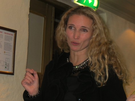 Dagny handing out a final gift of chocolate before leaving.